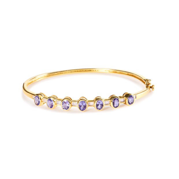 14K Yellow Gold Alternating Bezel Set 5MM Oval Shaped Tanzanite and 1/5 Cttw Diamond Bangle Bracelet (H-I Color, VS2-SI1 Clarity) - Fit's wrists up to 7.25" Inches
