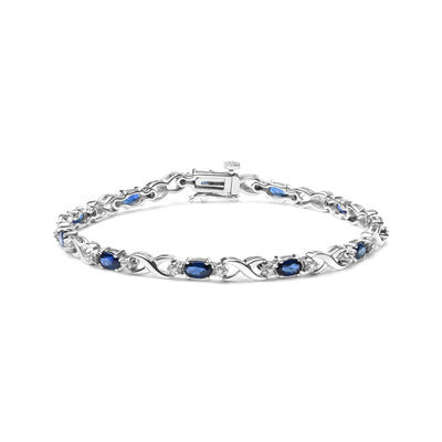 10K White Gold 5x4mm Oval Sapphire Gemstone and 1/10 Cttw Diamond Prong Set "X" Link Bracelet - Size 7" (H-I Color, SI1-SI2 Clarity)