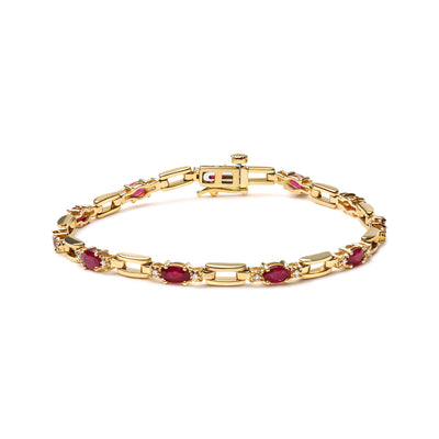 10K Yellow Gold Oval Ruby and 1/10 Cttw Diamond Bar Prong Set Bracelet (H-I Color, SI1-SI2 Clarity)  - Size 7"